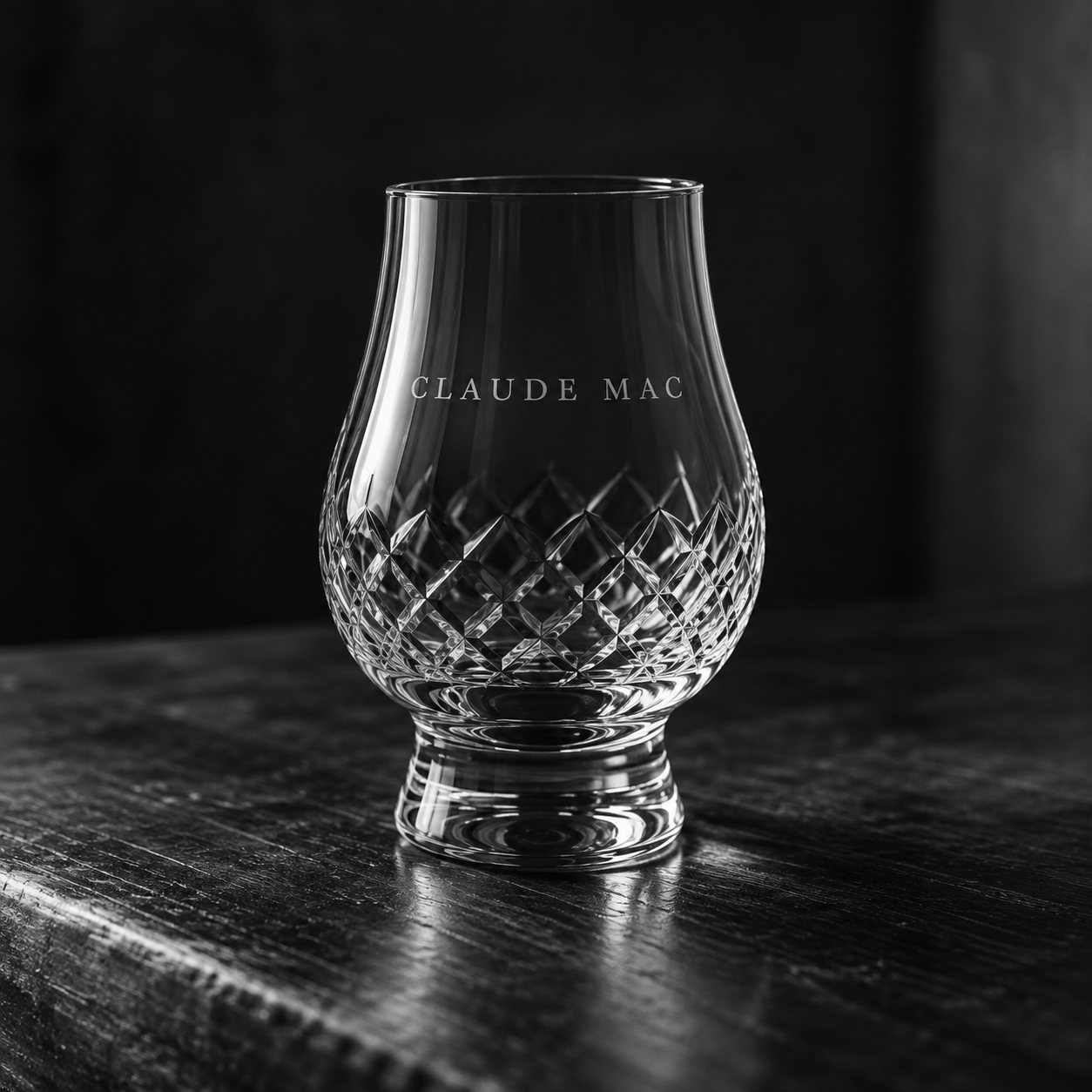 The Glencairn, empty on a dark wooden surface, wordmark etched on the bell